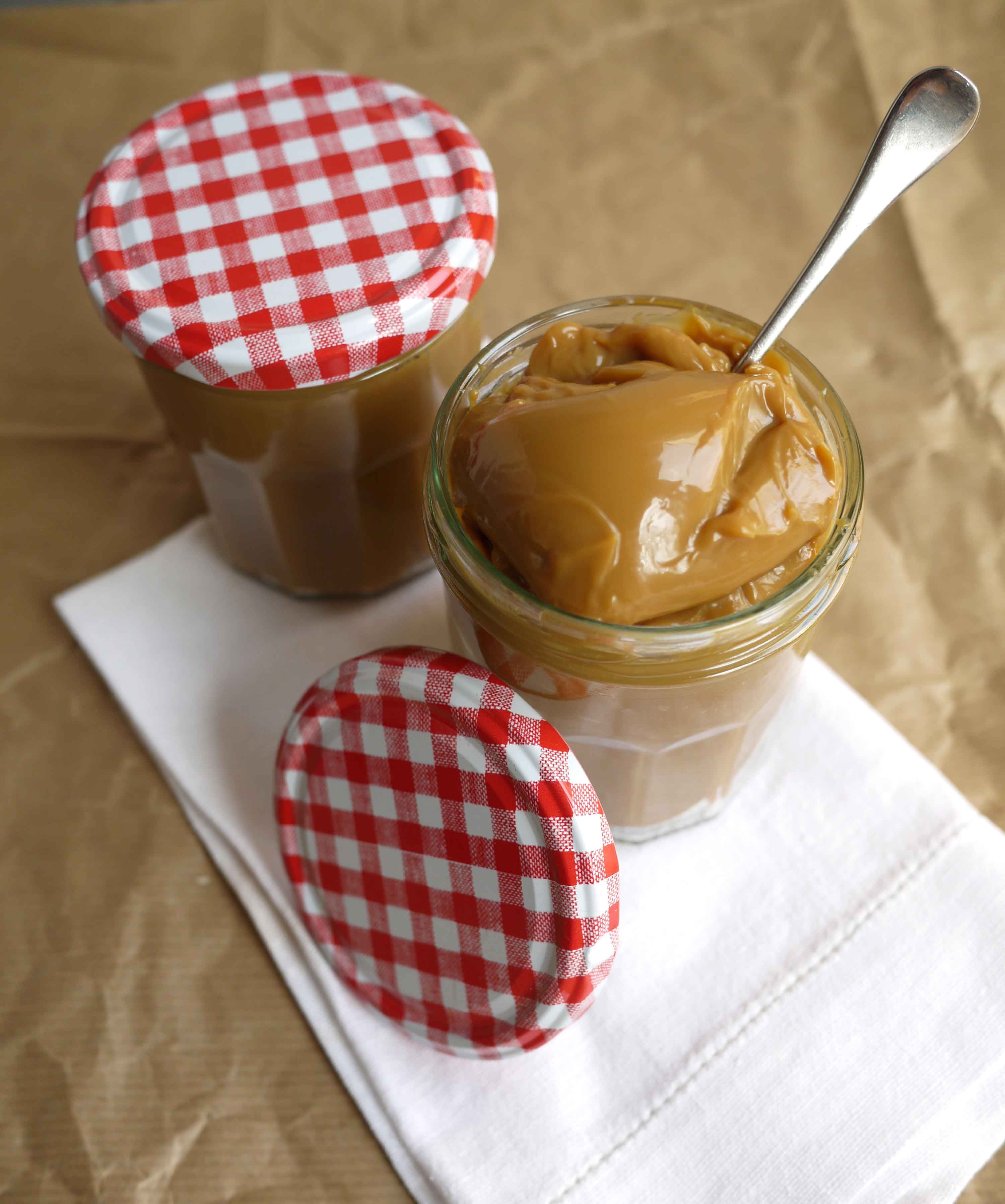 The easiest ever slow cooker (crockpot) home made condensed milk caramel sauce, made without cream or fuss. Perfectly smooth, not grainy, slow cooker caramel!