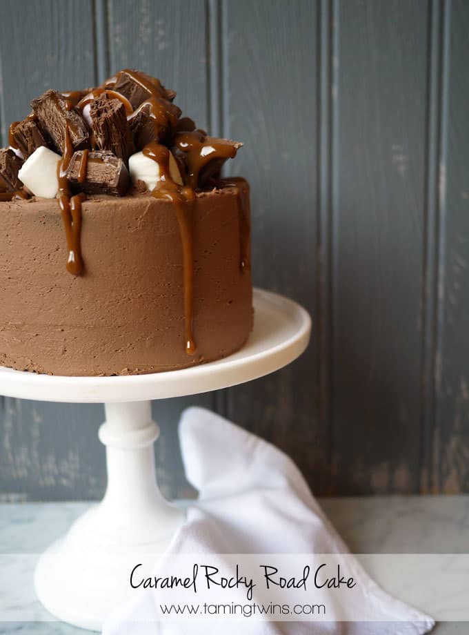 Caramel Rocky Road Layer Cake - The ultimate chocolate cake, stacked with chocolate pieces, marshmallows and delicious caramel.