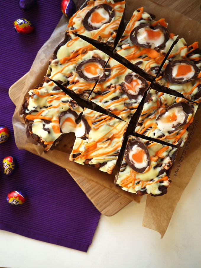 Cadbury Creme Egg Rocky Road - The ultimate Easter make! No bake, super easy and absolutely delicious. Great for bake sales, tea time treats and dessert. https://www.tamingtwins.com