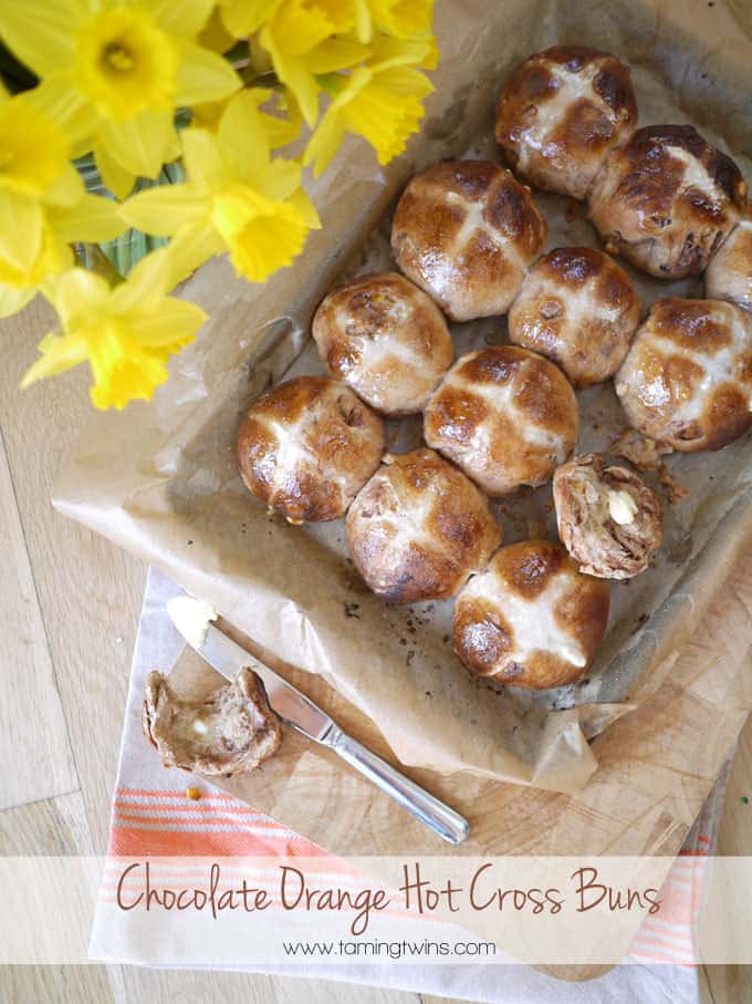Chocolate Orange Hot Cross Bun - A delicious teatime treat for Easter, a twist on the original and a really fun bake over the spring holiday period. | http://www.TamingTwins.com