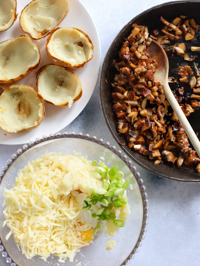 Ingredients for loaded potato skins, cheese, onions and bacon.