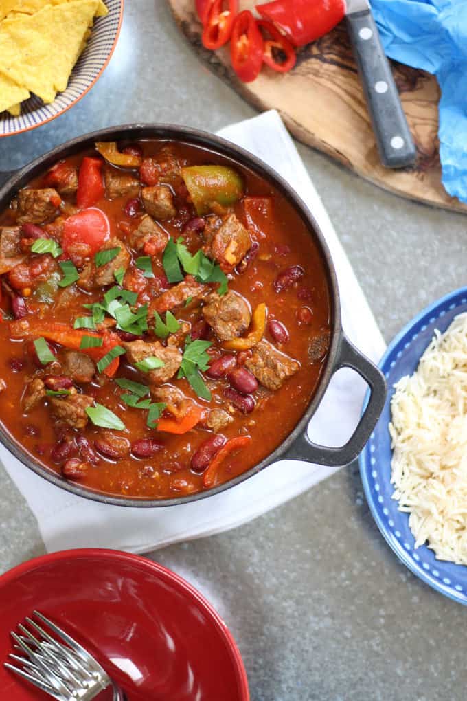This easy Chilli Con Carne recipe (or Chili Con Carne, if you're in the USA) is perfect for family dinners, not too spicy and easy to slow cook ready for later. Made with beef steaks (rather than mince) for a better texture, packed with extra vegetables, makes a brilliant freezer filler. https://www.tamingtwins.com