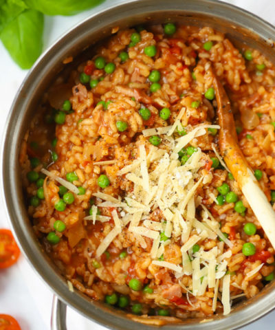 Oven Baked Risotto with Bacon Cheese and Peas in a Saucepan