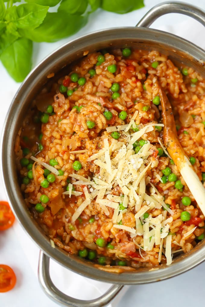 Oven Baked Risotto with Bacon Cheese and Peas in a Saucepan