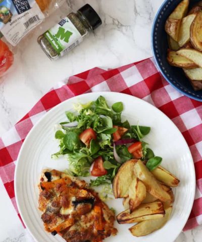Chicken breasts topped with pizza toppings and mozzarella cheese, a great higher protein, wheat free, gluten free, alternative to regular pizza. Served with potato wedges and salad for a delicious dinner.