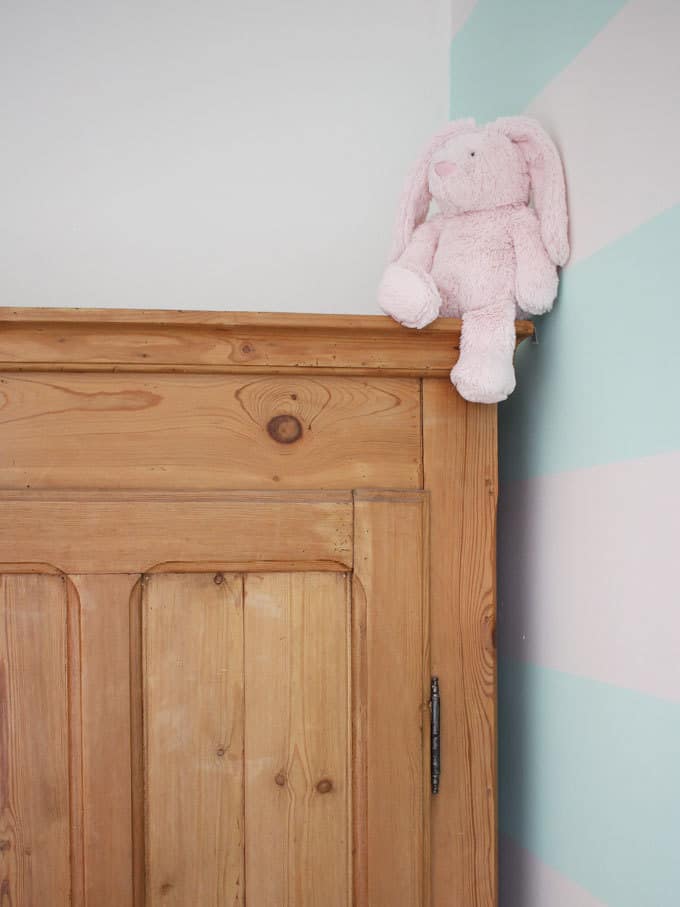 Antique pine wardrobe works perfectly in this room.. A little girl's pink and mint green bedroom tour. Inspiration and decoration ideas for a perfect room for a four year old girl.