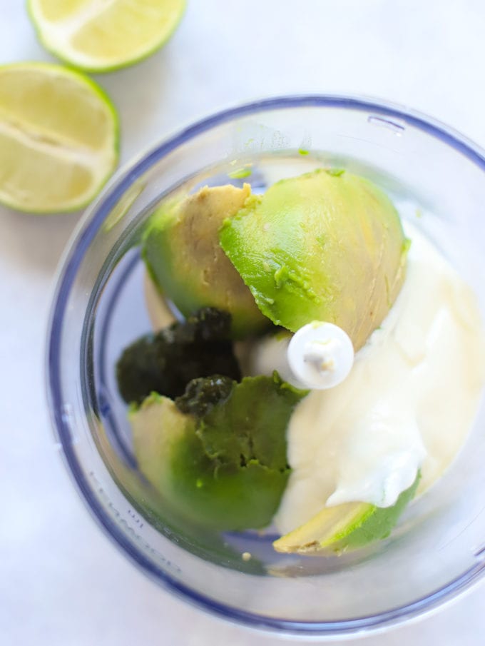 Avocado and yoghurt in a blender ready to make a dressing.