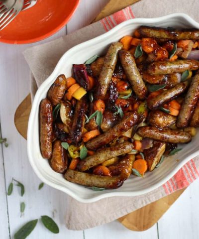 A quick and easy family dinner, this Sticky Sausage One Pan Traybake is simple and tasty. Using marmalade to add sweetness, the kids will love it!