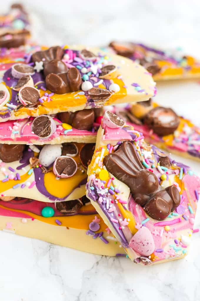 Show stopping Easter Chocolate Bark! Super simple and easy to make, topped with candy eggs, chocolates and sprinkles, this is a no bake, must make for Easter.