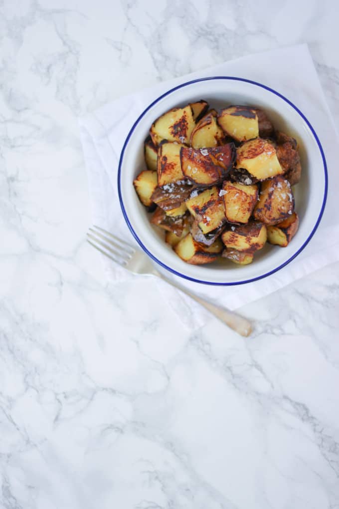Sauteed potatoes - hot fried leftover potatoes, served with a liberal sprinkle of sea salt. 