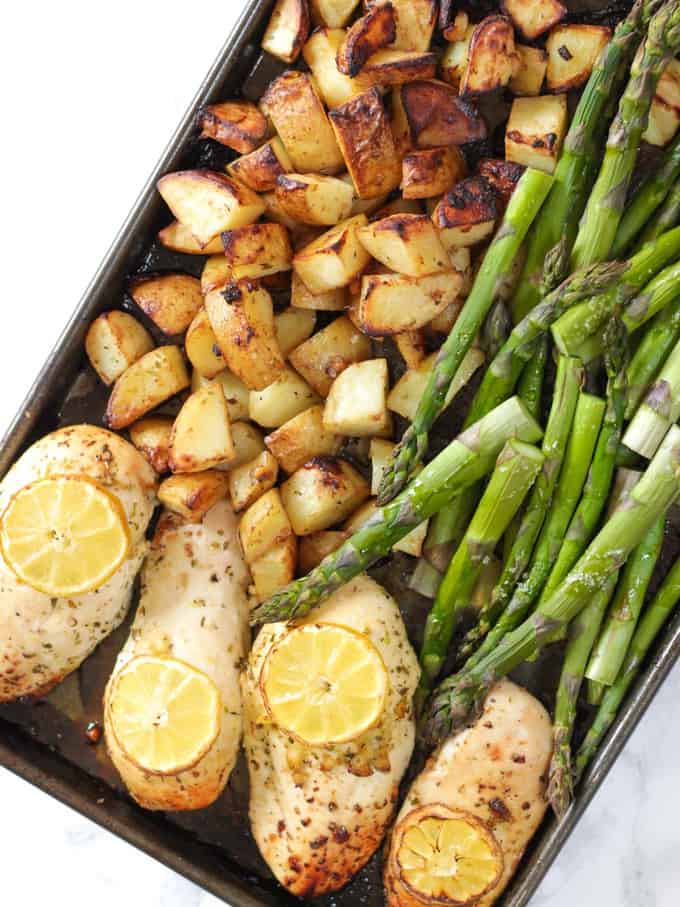 This One Pan Lemon Asparagus Chicken recipe is a quick and simple dinner using chicken breasts, roasted with potatoes, asparagus, lemon and honey. A really easy family meal.