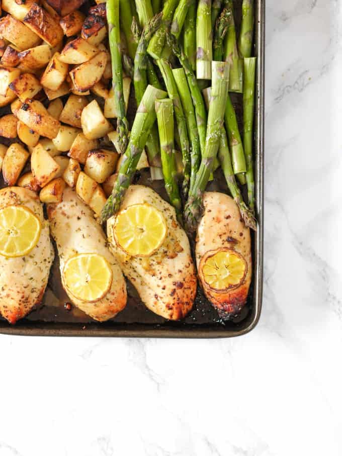 This One Pan Lemon Asparagus Chicken recipe is a quick and simple dinner using chicken breasts, roasted with potatoes, asparagus, lemon and honey. A really easy family meal.