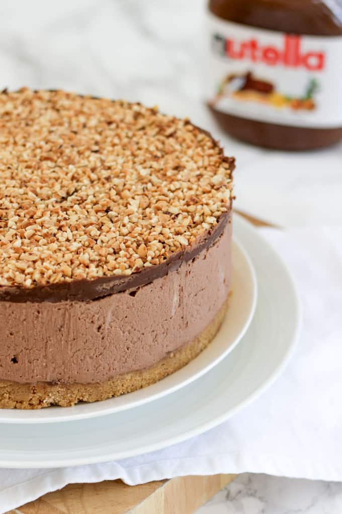 How to make the best ever NO BAKE NUTELLA CHEESECAKE! (With VIDEO tutorial!) This delicious cheesecake is the ultimate in Nutella, chocolate and hazelnut indulgence. This no bake dessert is quick and simple, easy enough for anyone, this is a must try pudding recipe! https://www.tamingtwins.com