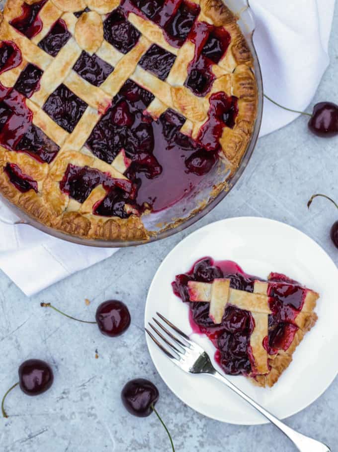 Cinnamon Cherry Pie Lattice Recipe - Made with delicious, juicy, fresh cherries. The perfect summer time dessert.