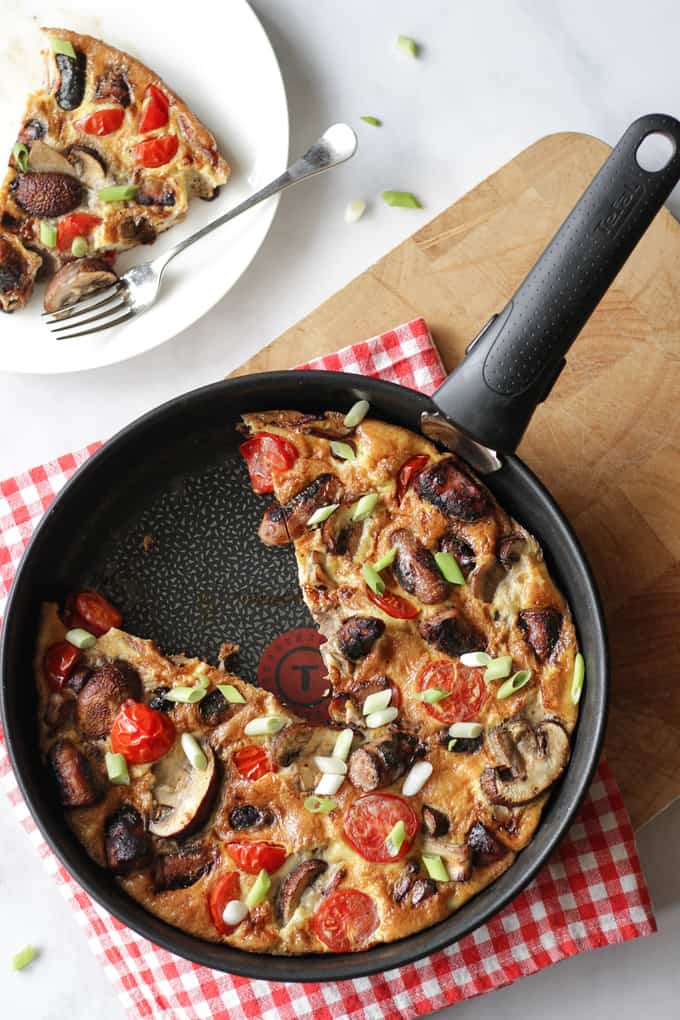 Full English Breakfast Omelette - The easiest ever "fry up" breakfast, all cooked in one pan. Packed with sausages, bacon, mushrooms, tomatoes and eggs. Perfect for breakfast, lunch or brunch.