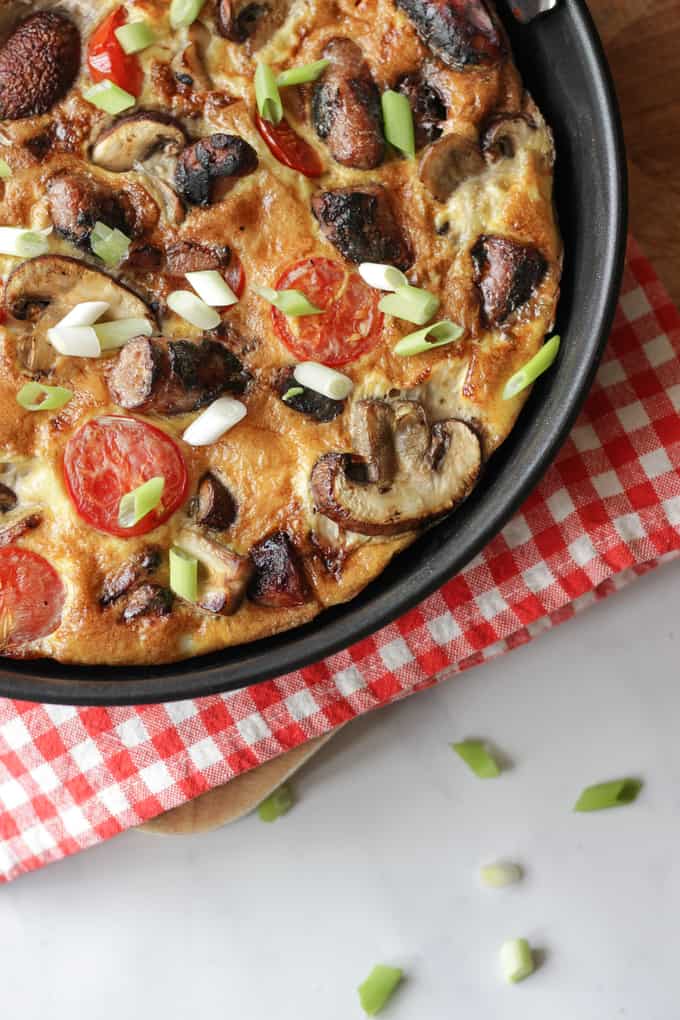 Full English Breakfast Omelette - The easiest ever "fry up" breakfast, all cooked in one pan. Packed with sausages, bacon, mushrooms, tomatoes and eggs. Perfect for breakfast, lunch or brunch.