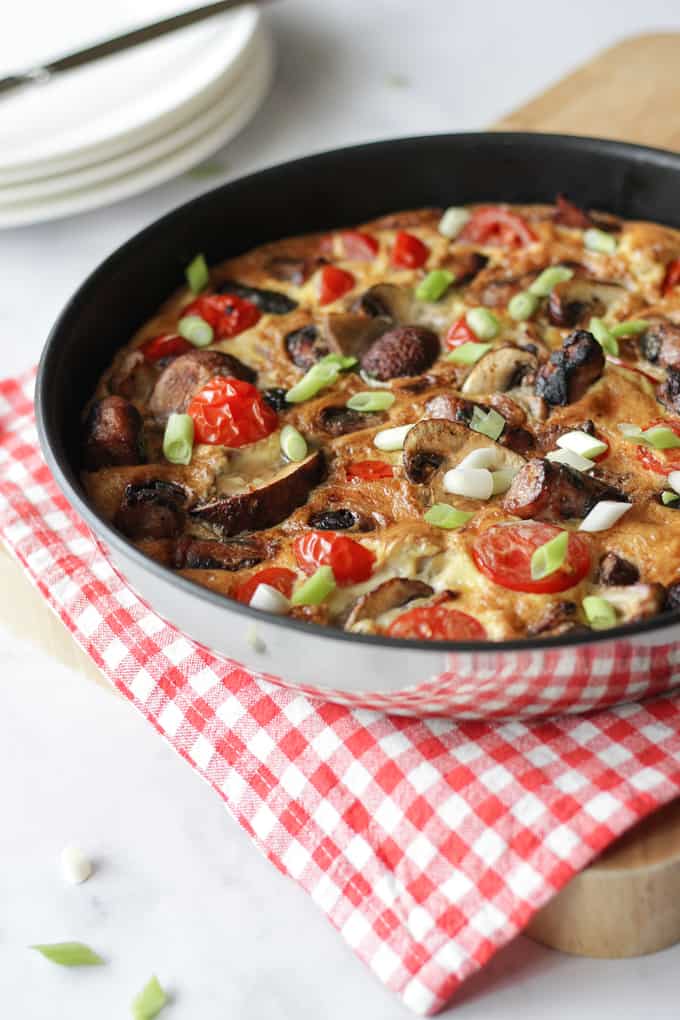 Full English Breakfast Omelette - The easiest ever "fry up" breakfast, all cooked in one pan. Packed with sausages, bacon, mushrooms, tomatoes and eggs. Perfect for breakfast, lunch or brunch.