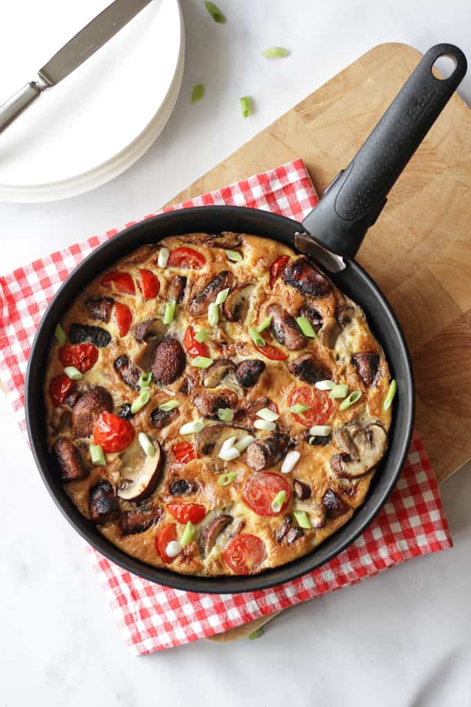 Full English Breakfast Omelette - The easiest ever "fry up" breakfast, all cooked in one pan. Packed with sausages, bacon, mushrooms, tomatoes and eggs. Perfect for breakfast, lunch or brunch.