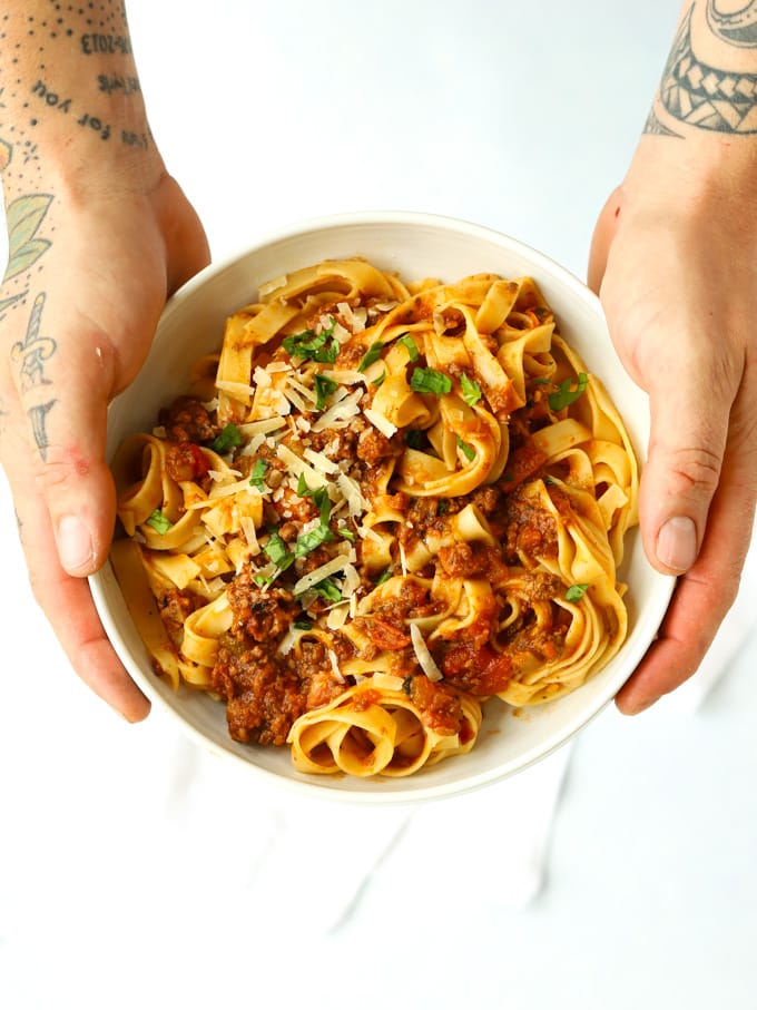 Beef bolognese recipe with pasta and parmesan and basil