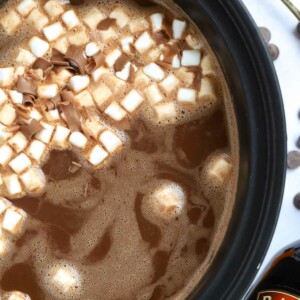 baileys hot chocolate made in a slow cooker with cream and cocoa