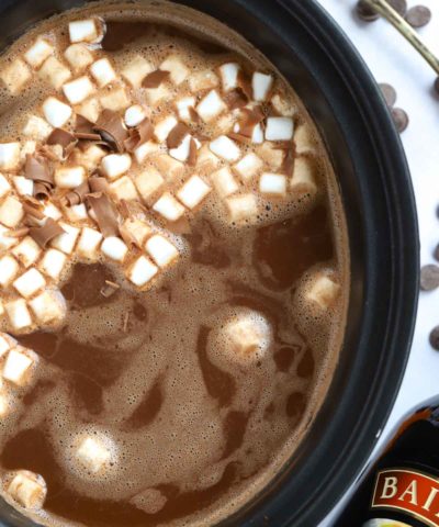 baileys hot chocolate made in a slow cooker with cream and cocoa