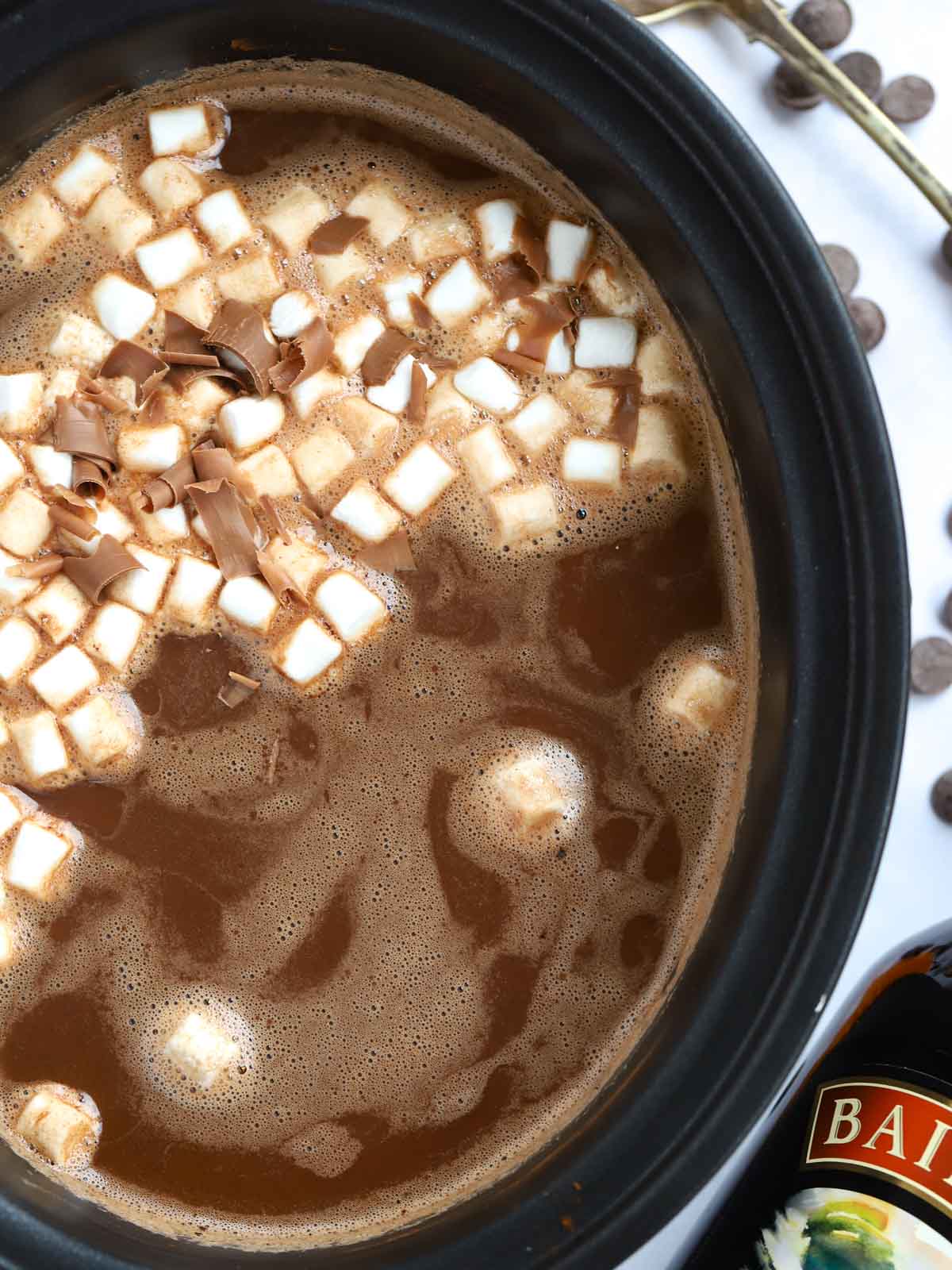 baileys hot chocolate made in a slow cooker with cream and cocoa