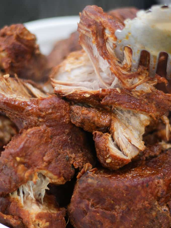 Chunks of slow cooked pork should ready to be shredded for instant pot pulled pork.