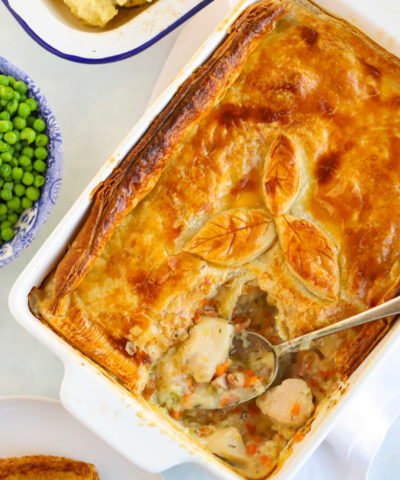 Chicken pie recipe served with peas and mashed potato
