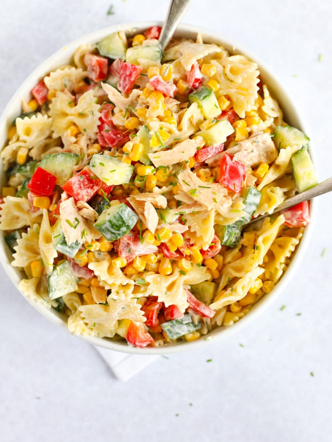 Healthy and quick Tuna Salad with pasta, peppers, sweetcorn and dressing.