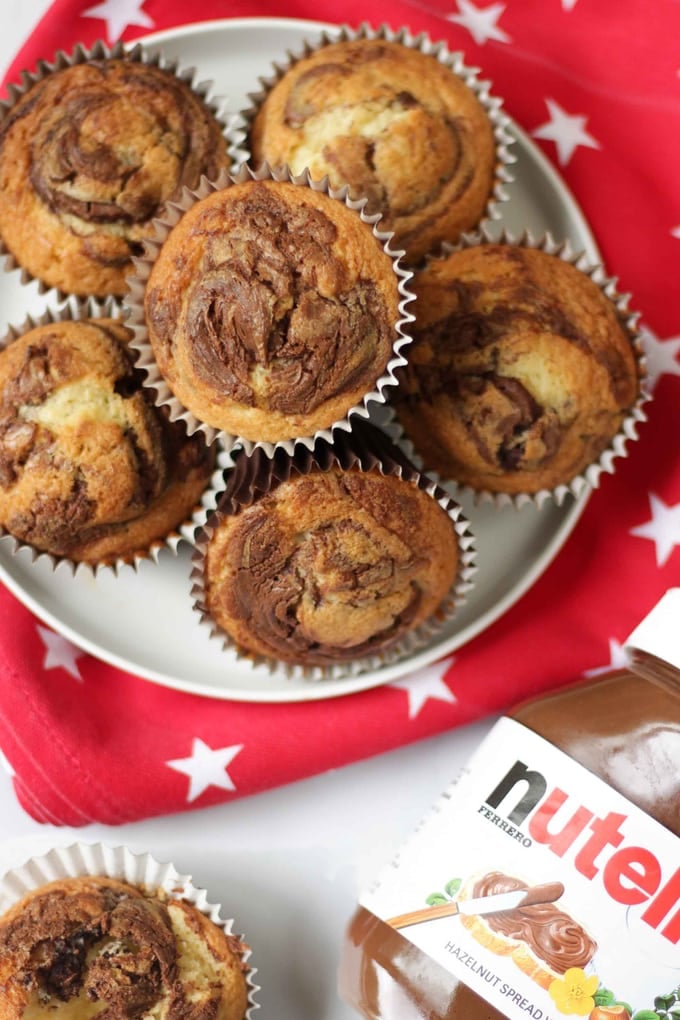 Easy Nutella Muffins recipe – These Nutella muffins are super easy to make, a basic cake mixture with the delicious addition of a spoonful of Nutella. A really simple and delicious chocolate cupcake, perfect for baking with children or for after school snacks. #tamingtwins #baking #muffins #nutella #nutellarecipes #cupcakerecipes #easybaking #cake #cakerecipes