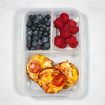 Mini quiches in a plastic lunchbox as a healthy packed lunch