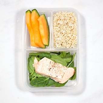 Healthy lunchbox idea of salmon, spinach and rice