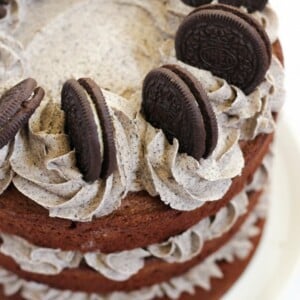 Oreo cake chocolate layer cake topped with cookies and cream birthday cake icing