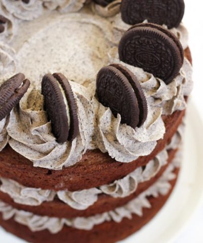 Oreo cake chocolate layer cake topped with cookies and cream birthday cake icing