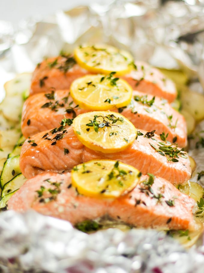 Salmon fillets with lemon slices cooked in foil 