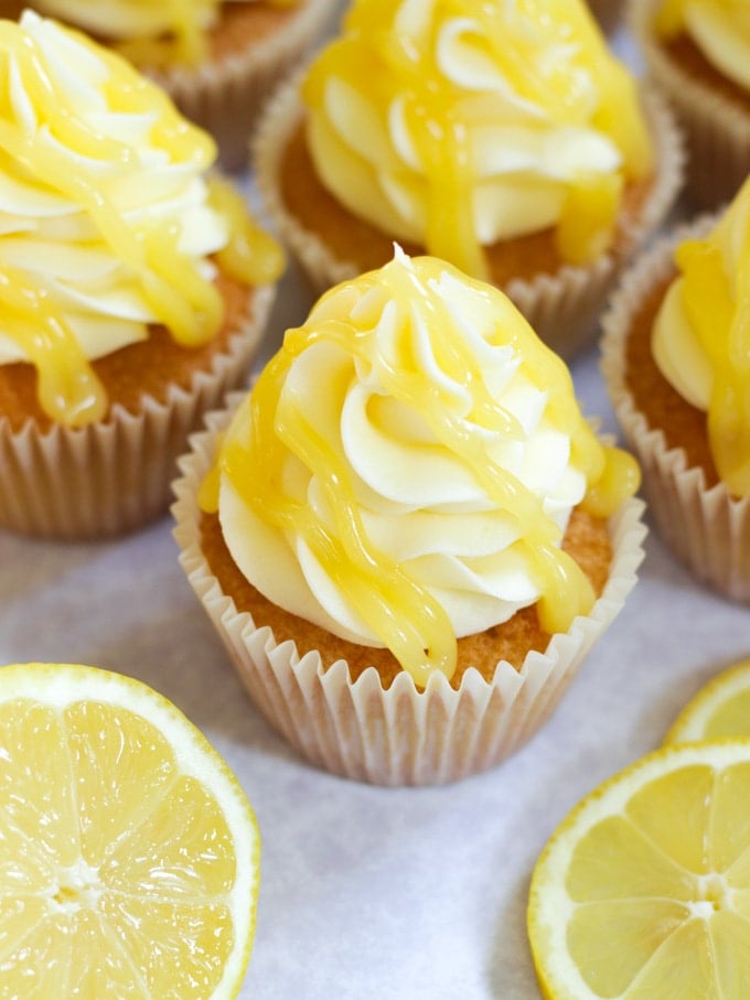 Lemon drizzle cupcakes topped with lemon buttercream and lemon curd topping