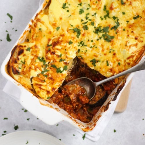 Vegetable Moussaka with slice on a plate and fork