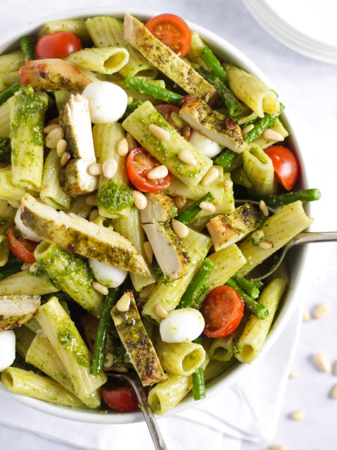 Easy chicken pasta with green pesto, veggies and cheese