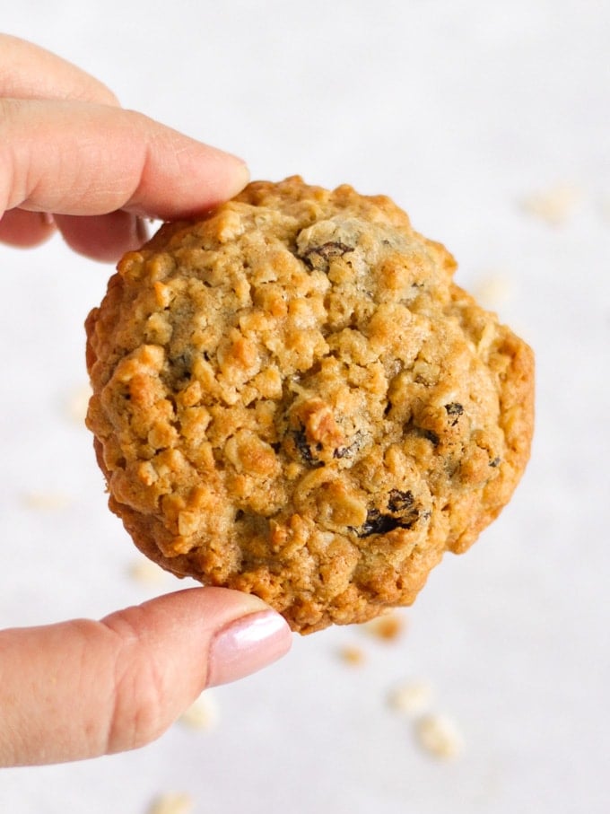 Fingers holding an easy and healthy oat biscuit