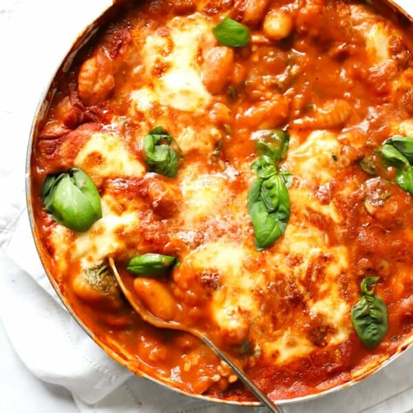 Tomato, basil and spinach gnocchi topped with parmesan cheese