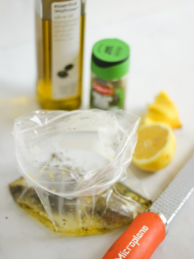 bag with lemon and herb mixture in