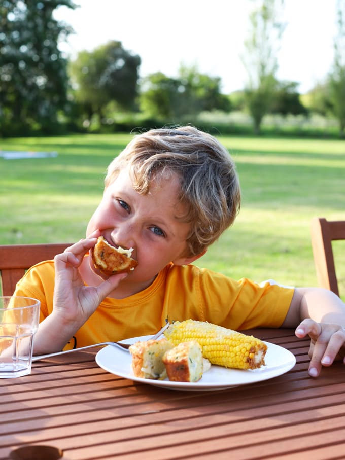 Boy eating a muffin