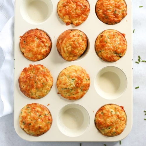 Easy savoury muffins topped with cheese and packed with corn