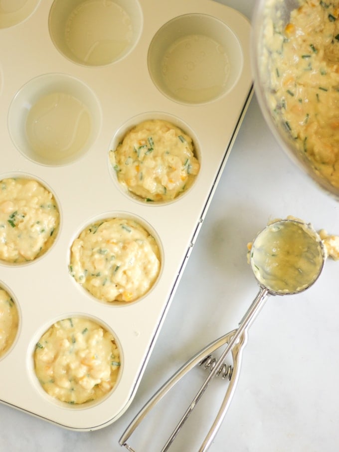 muffin batter mixture and an ice cream scoop