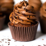 Chocolate muffins with swirls decoration