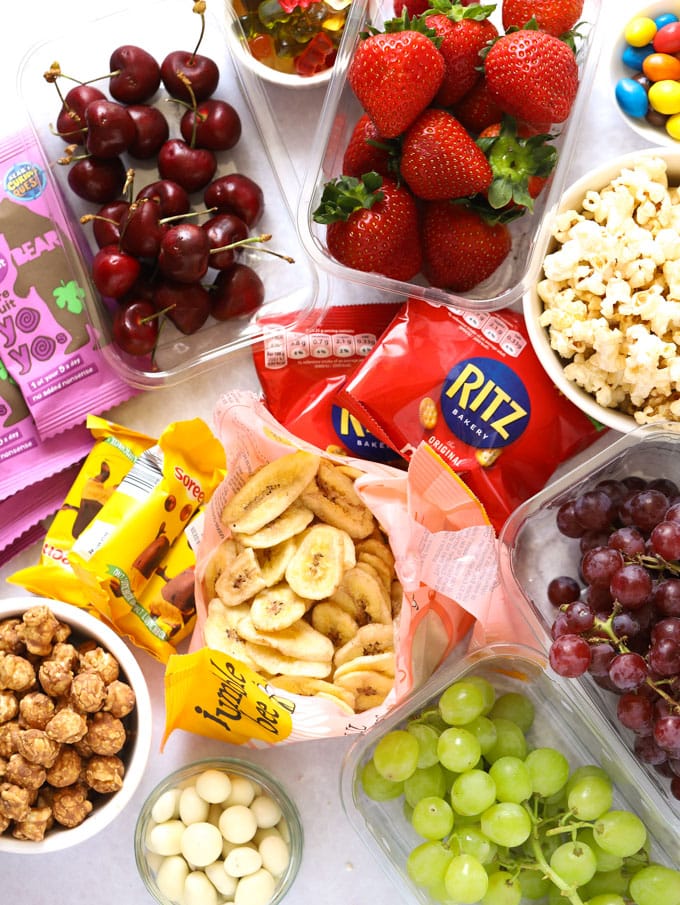 Banana chips, strawberries, cherries, grapes, popcorn and treats