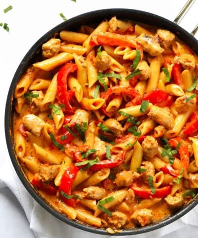 Easy spicy sausage pasta bake recipe in a frying pan