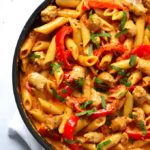Easy sausage pasta recipe made in one pot with peppers, tomatoes and garlic