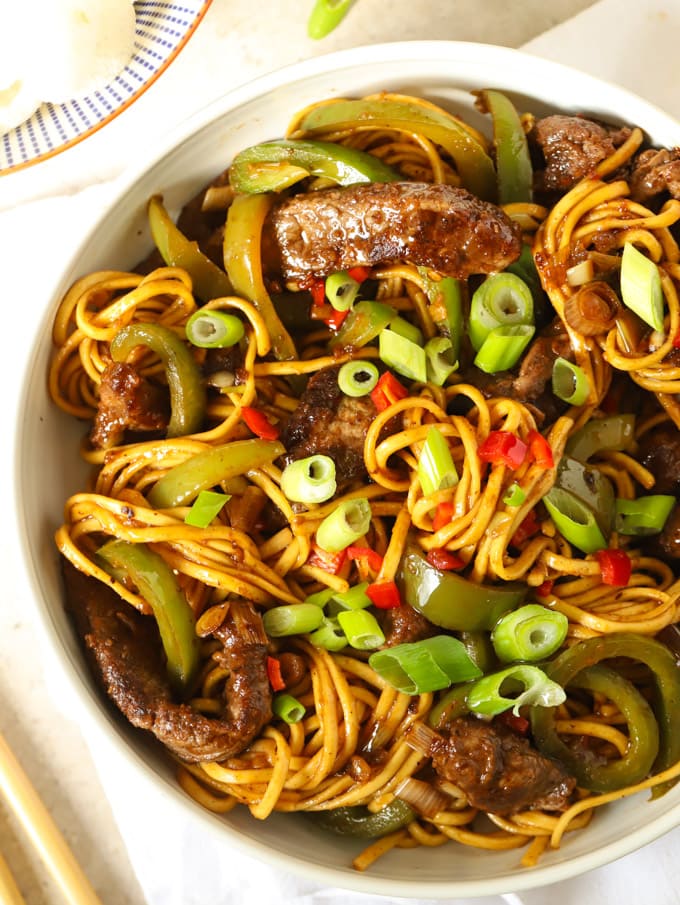Beef stir fry with noodles and sticky sauce