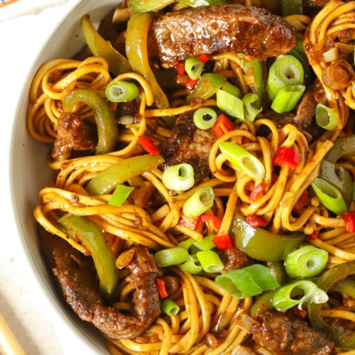 Beef stir fry with noodles and sticky sauce